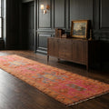 Orange Persian runner rug in a styled room