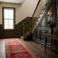 Red Persian runner rug in a styled room