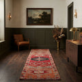 Red Persian runner rug in a styled room