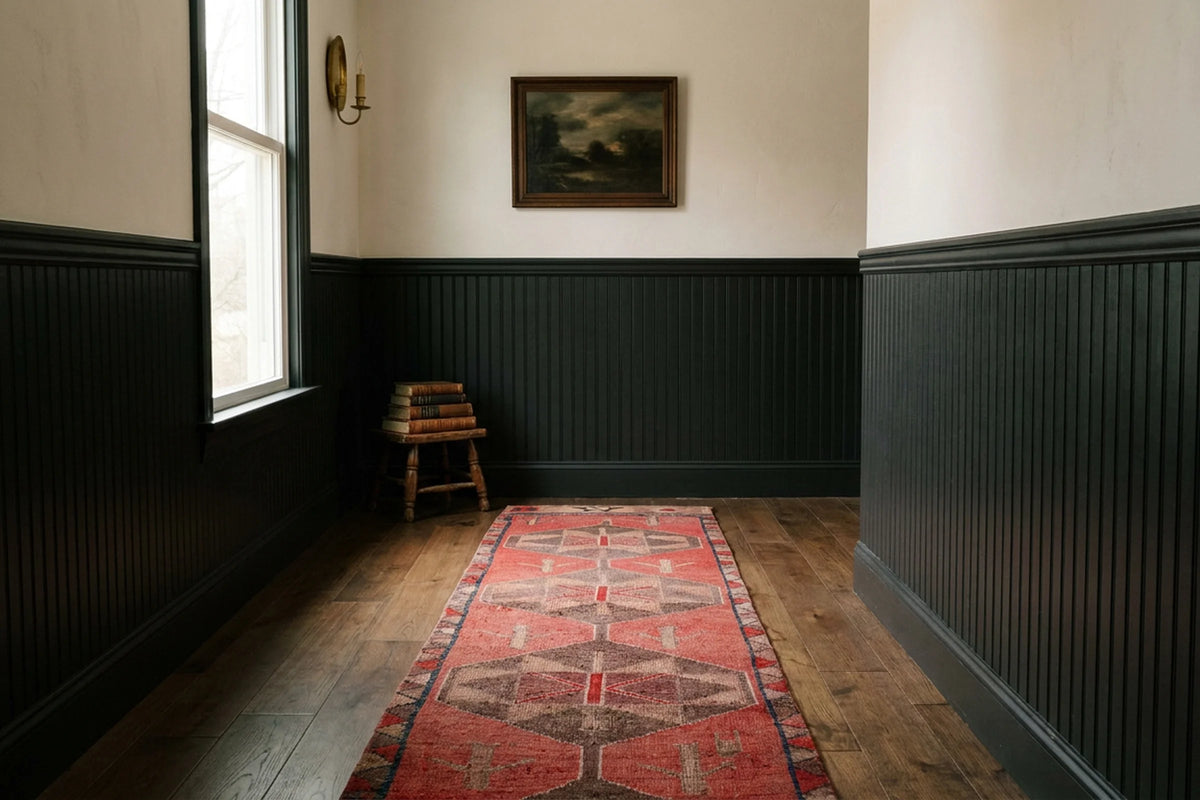 Red Persian runner rug in a styled room