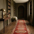 Red Persian runner rug in a corridor