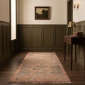 Pink Persian runner rug in a hallway