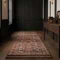 Brown Persian runner rug in a styled room