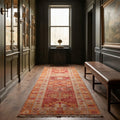 Red Persian runner rug in a styled room