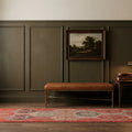 Red Persian runner rug in a styled room