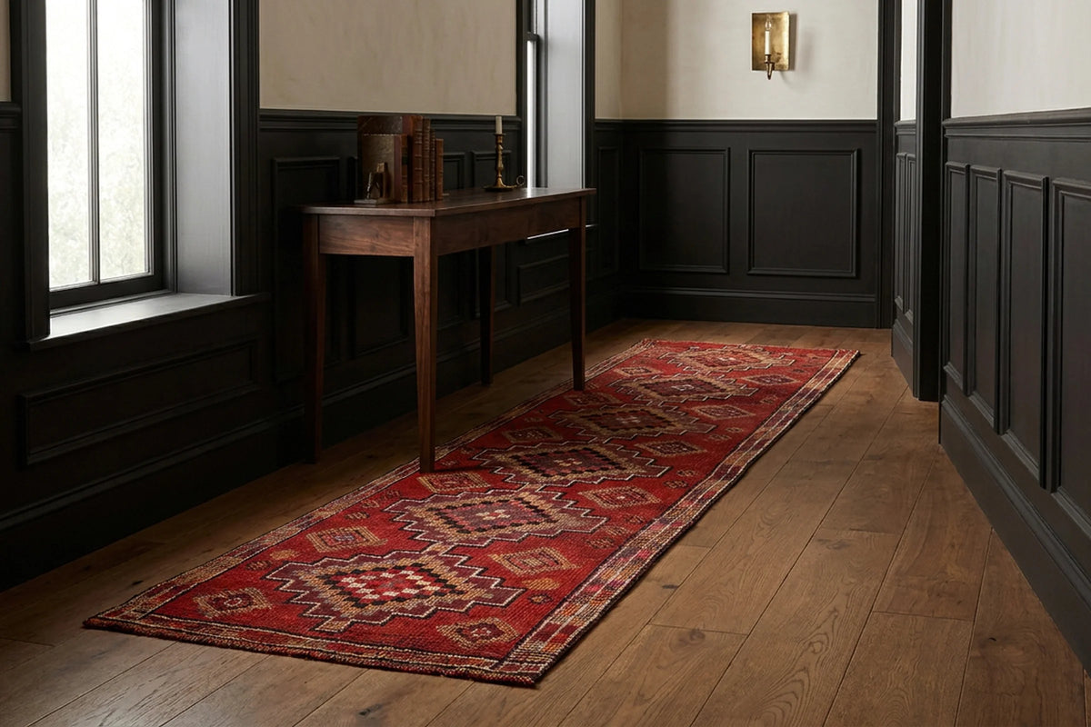 Red Persian runner rug in a hallway
