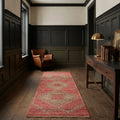 Red Persian runner rug in a study