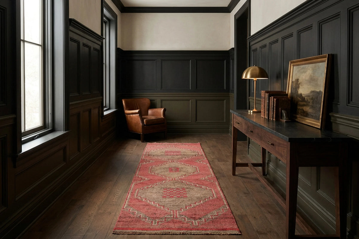 Red Persian runner rug in a study