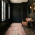 Orange Persian runner rug in a styled room