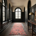 Pink Persian runner rug in a conservatory