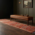 Red Persian runner rug in a styled room