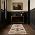 Beige Persian runner rug in a styled room