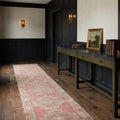 Pink Persian runner rug in a styled room