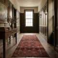 Red Persian runner rug in a styled room