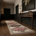 Beige Persian runner rug in a styled room