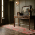 Red Persian runner rug in a conservatory