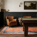 Orange Persian runner rug in a styled room