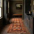 Brown Persian runner rug in a styled room