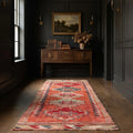 Pink Persian runner rug in a corridor