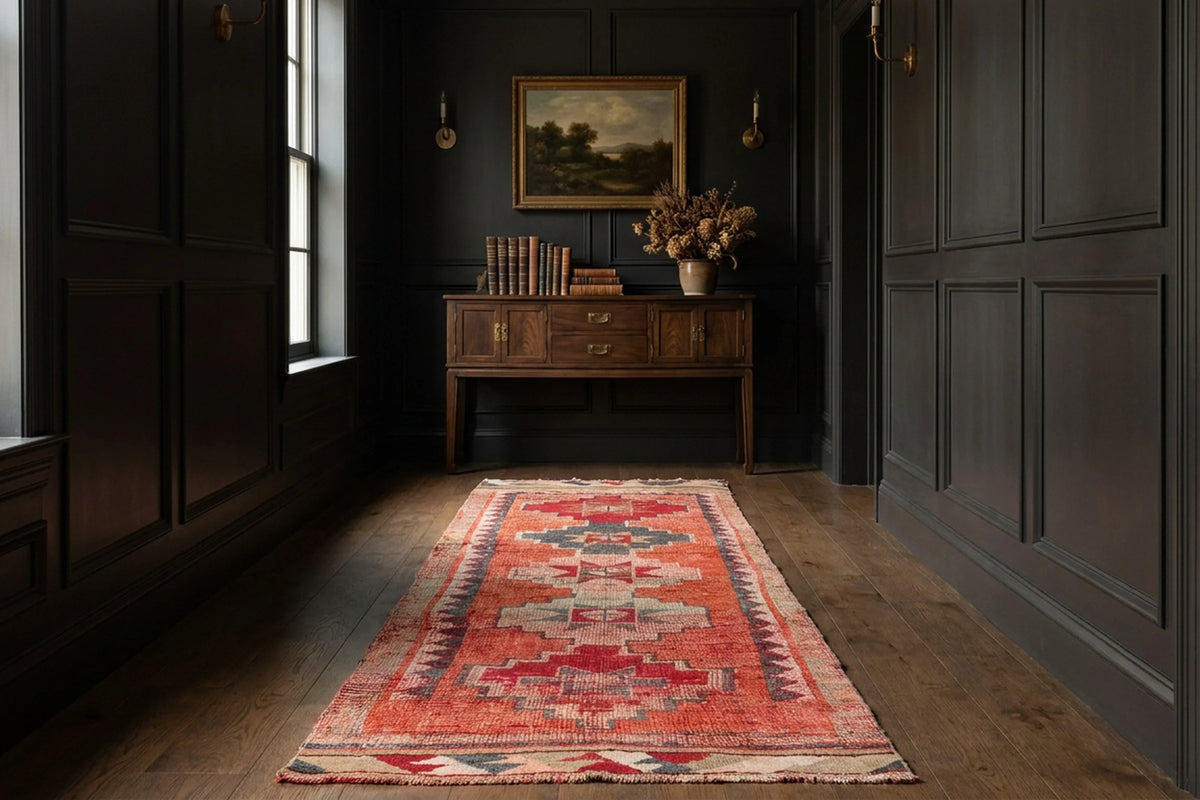 Pink Persian runner rug in a corridor
