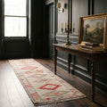Beige Persian runner rug in a styled room