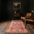 Red Persian runner rug in a styled room