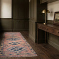 Pink Persian runner rug in a landing