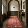 Red Persian runner rug in a styled room
