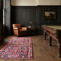 Red Persian runner rug in a styled room