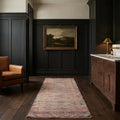 Pink Persian runner rug in a styled room