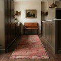 Red Persian runner rug in a kitchen