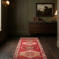 Pink Persian runner rug in a styled room