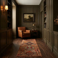Orange Persian runner rug in a styled room
