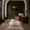Beige Persian runner rug in a conservatory