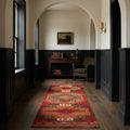 Red Persian runner rug in a hallway