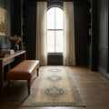 Beige Persian runner rug in a styled room