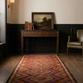 Pink Persian runner rug in a hallway
