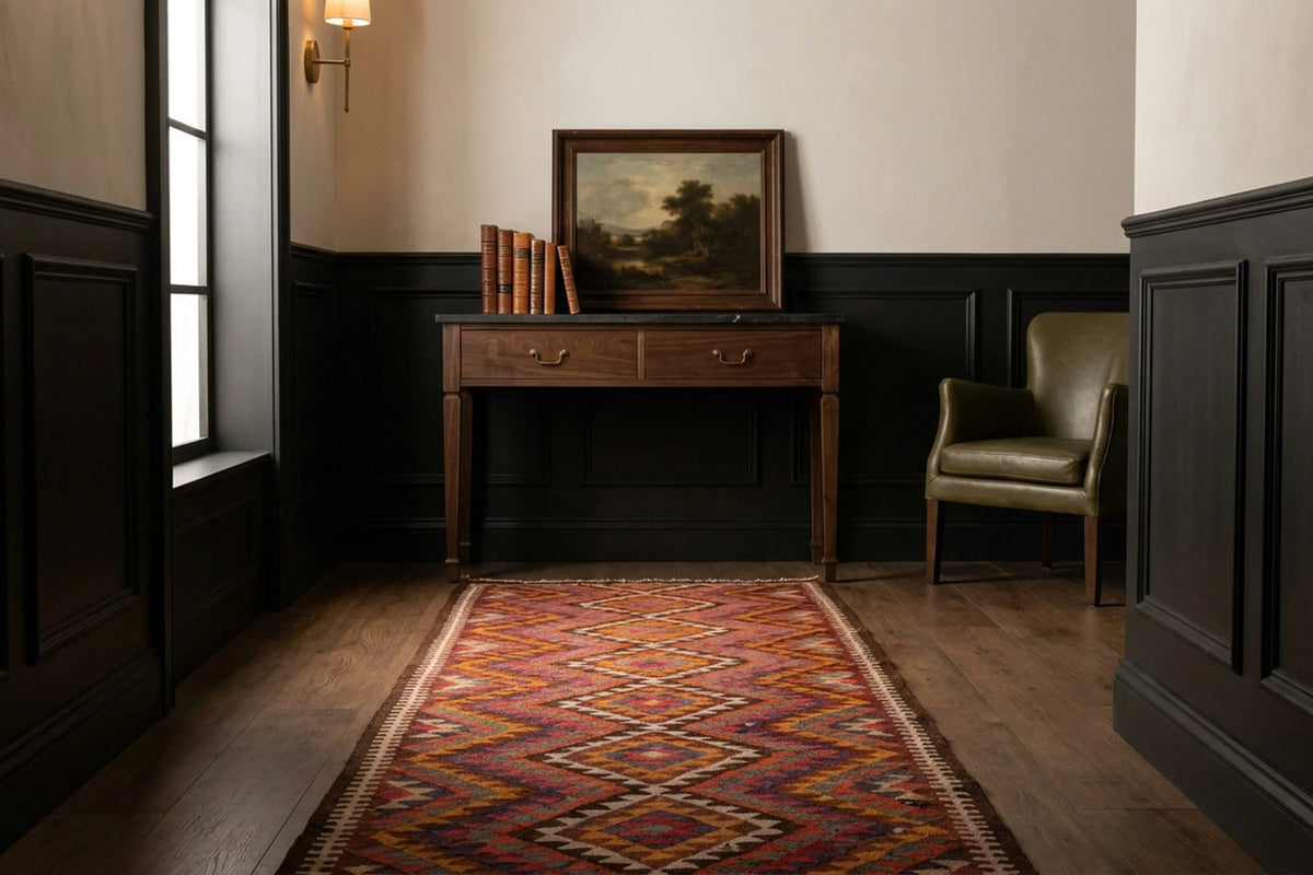 Pink Persian runner rug in a hallway