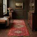 Red Persian runner rug in a styled room