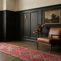 Red Persian runner rug in a styled room