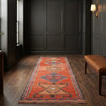 Orange Persian runner rug in a styled room