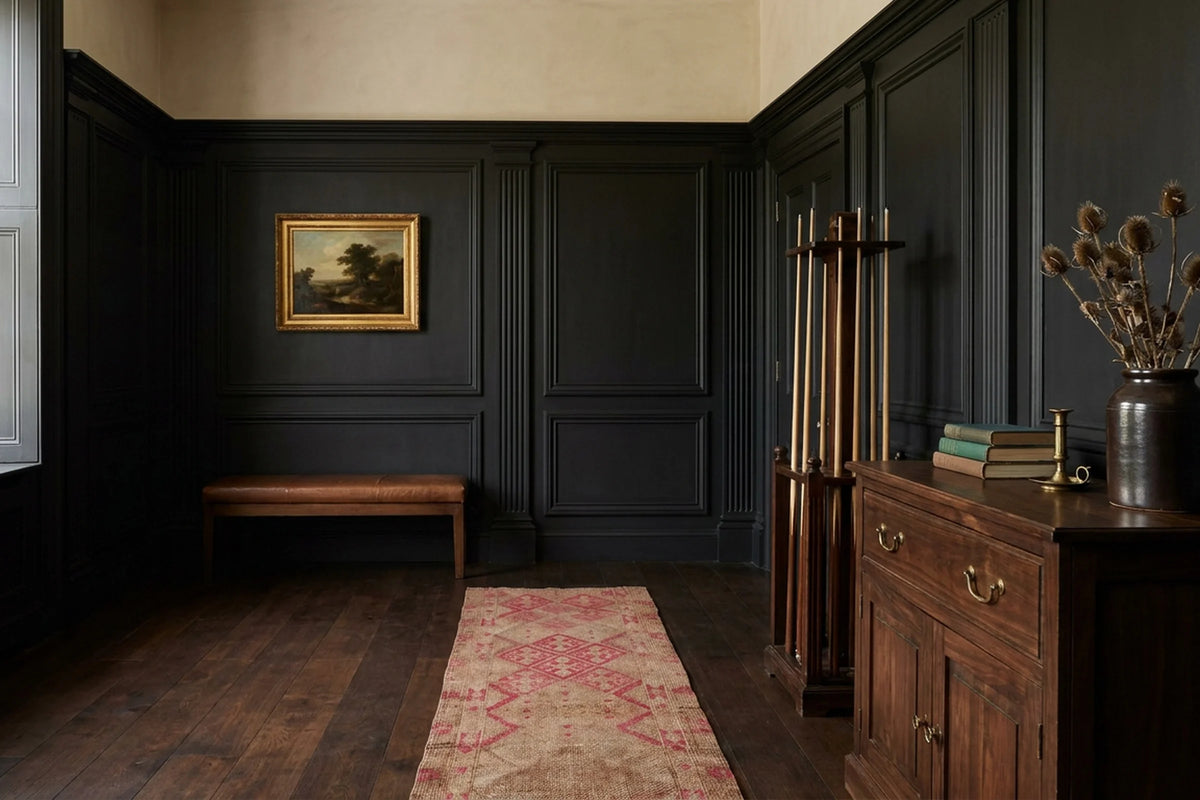 Beige Persian runner rug in a den