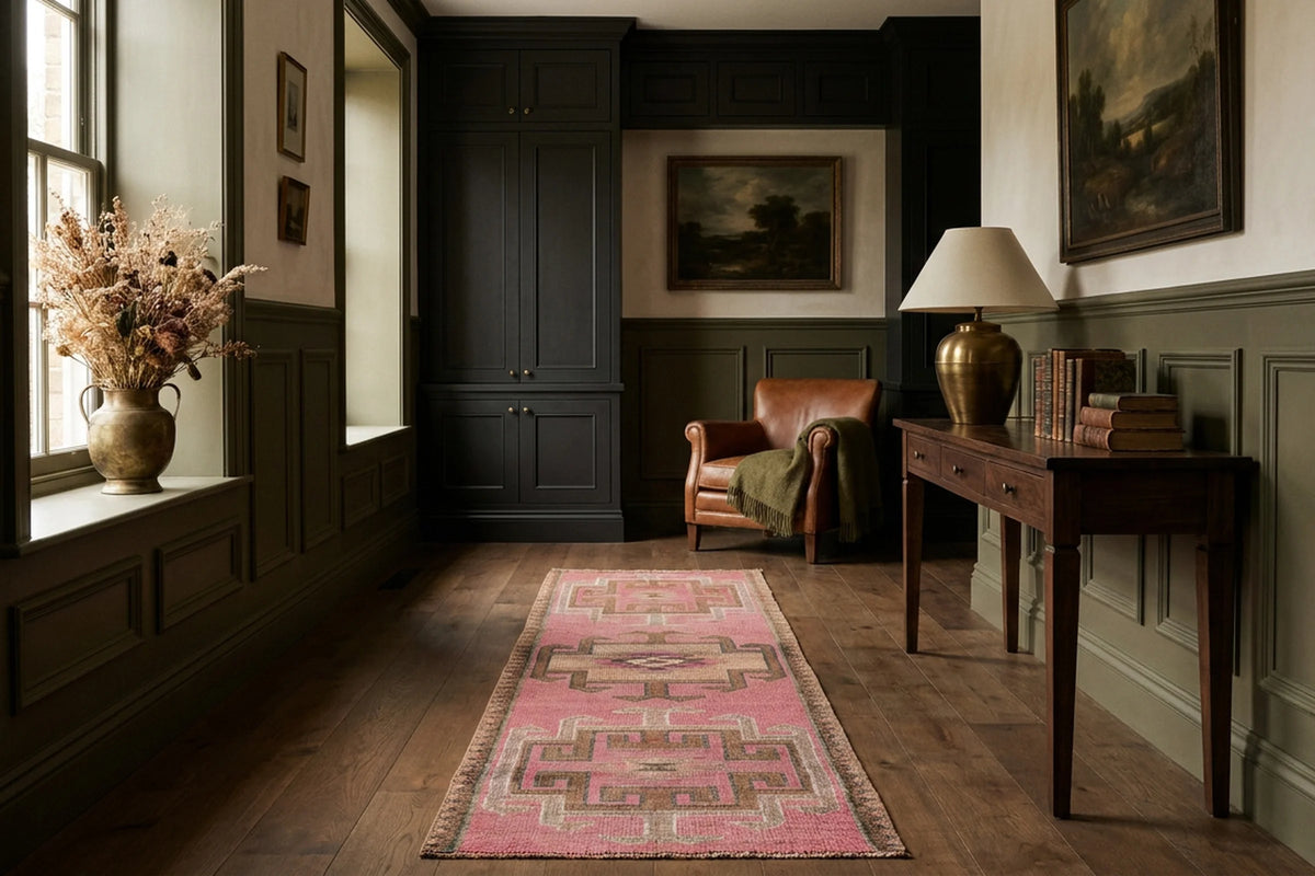 Pink Persian runner rug in a den