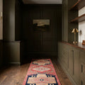 Pink Persian runner rug in a styled room
