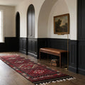 Red Persian runner rug in a styled room