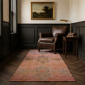 Pink Persian runner rug in a styled room