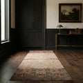 Brown Persian runner rug in a styled room