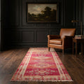 Pink Persian runner rug in a styled room
