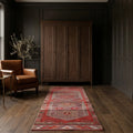 Red Persian runner rug in a styled room