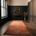Orange Persian runner rug in a styled room